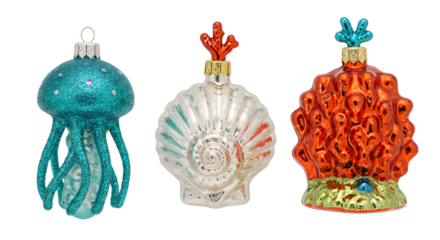 Colorful glass Christmas ornaments shaped like a jellyfish, a seashell, and coral reef, perfect for unique holiday decorations
