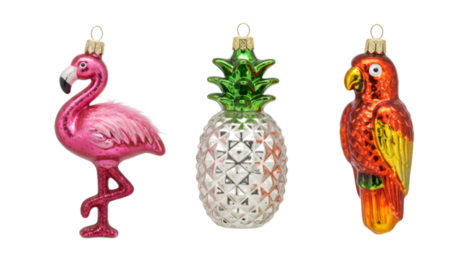 Festive glass Christmas ornaments shaped as a pink flamingo, silver pineapple, and vibrant parrot, perfect for tropical holiday decorations