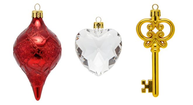 Red Christmas ornament, clear heart-shaped glass decoration, and ornate golden vintage key on white background, perfect for holiday crafts