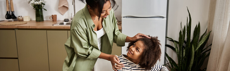 Cherishing moments of love and laughter between mother and daughter at home
