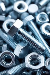 A close-up image of assorted metallic bolts and nuts, showcasing their intricate details and shine, ideal for manufacturing, hardware, and construction-themed projects or articles,