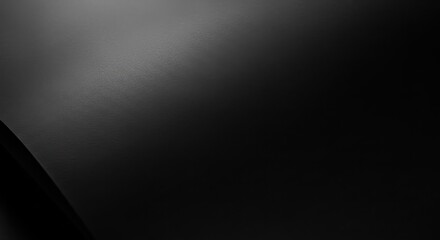Abstract background with smooth dark surface and subtle lighting