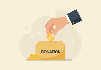 Hand putting coin in donation box with money. Charity, giving, and fundraising concept.