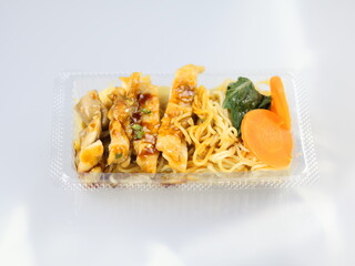 This image shows a Teriyaki Noodle Bento Box or similar Japanese-inspired meal.