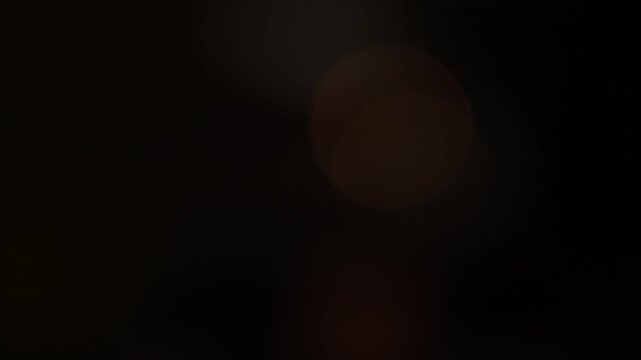 Out of focus flashing beacons in the dark on a police car, traffic police patrol, law enforcement concept