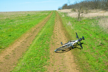 bicycle and field road. Spring ride through the fields