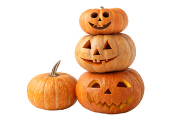 A festive stack of three carved jack o lanterns with a single whole pumpkin beside them isolated on transparent background