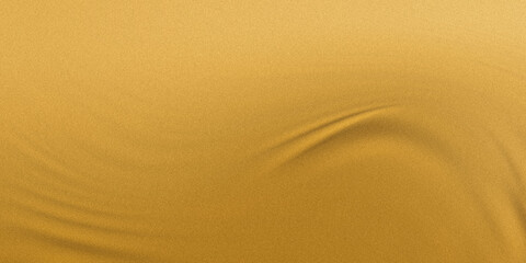 A closeup view of golden sand with subtle ripples and waves, creating a textured abstract background