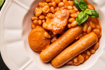 Cassoulet beans with meat and sausage french cuisine vegetables dish natural product tasty snack fresh delicious gourmet food background on the table rustic top view copy space