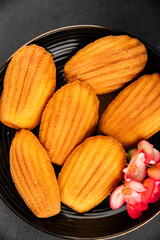 Madeleine cookies sweet dessert traditional french sweets tasty snack fresh delicious gourmet food background on the table rustic top view copy space