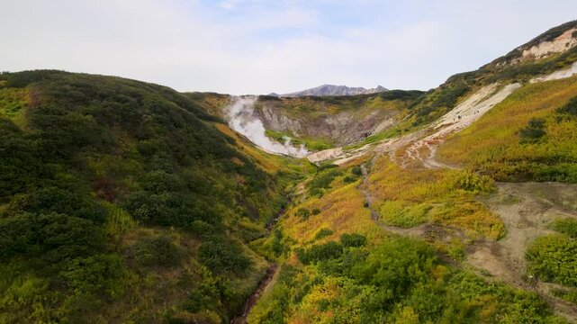 Steaming fumaroles and geothermal vents of Dachnye hot springs, Kamchatka