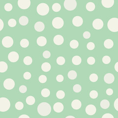 Seamless Pattern of White Circles on Green Background