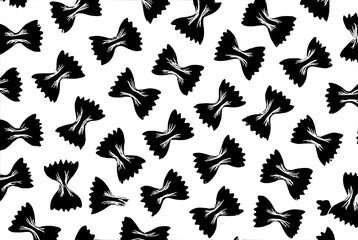 Black bow pasta on white background. Pattern of dark farfalle on white