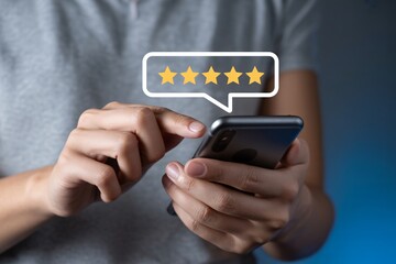 Person using smartphone to give five star rating and feedback online today