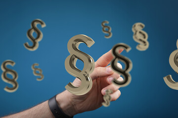 Abstract image of a hand interacting with floating paragraph symbols, ideal for legal or law concepts.