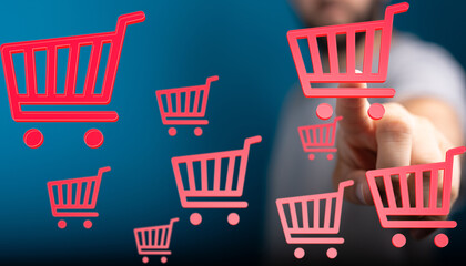 Person interacts with digital shopping carts, representing online shopping and e-commerce.
