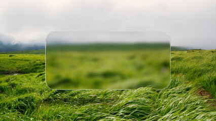 Horizontal glass display over green grass field with blurred landscape. Concept of digital overlay, AR marketing, eco-visuals, template for futuristic branding, and immersive design.