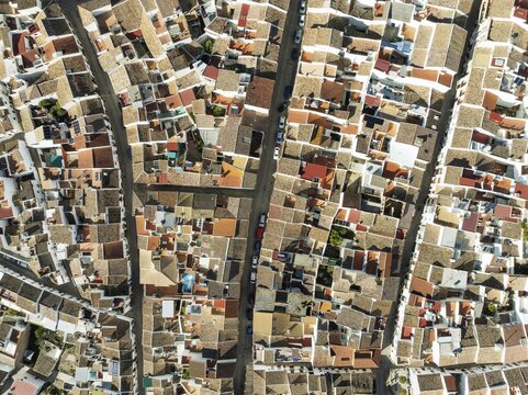 Streets and rooftops in the White Town of Olvera. Aerial view. Drone shot. C&aacute;diz province, Andalusia, Spain