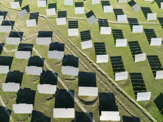 Rows of solar panels at a photovoltaic plant near town of Espejo. Aerial view. Drone shot. Córdoba province, Andalucía, Spain