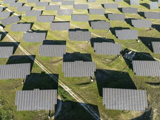 Rows of solar panels at a photovoltaic plant near town of Espejo. Aerial view. Drone shot. Córdoba province, Andalucía, Spain