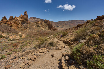 Woman hiker and photographer at Roques de Garcia in Tenerife