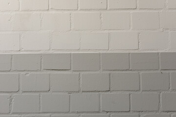 High-resolution image of a brick wall with a two-tone color scheme. Perfect for backgrounds, textures, and design projects.