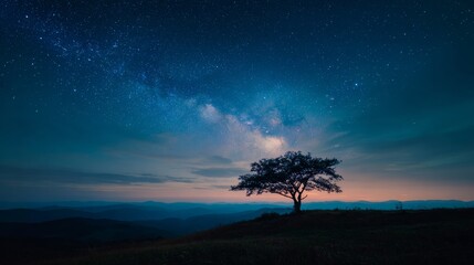 Solitary tree stands tall on a hill, silhouetted against a breathtaking starry night sky, showcasing cosmic colors and serene ambiance