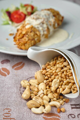 Delicious dish with nuts and cream sauce