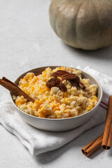 Rice millet porridge with pumpkin and cinnamon. Healthy breakfast