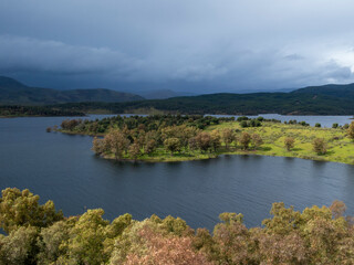 Fototapeta premium Gabriel y galán reservoir reflecting dramatic sky in extremadura, spain