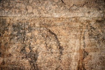 Unique texture of aged stone wall with intricate patterns captures the essence of nature's artistry