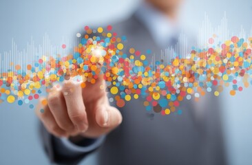 Man in a suit points to a cluster of colorful dots overlayed on a graph against a soft blue background, creating a tech-forward and vibrant visual