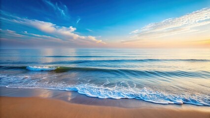 Fototapeta premium Serene coastal sunrise gentle waves caress a tranquil sandy shore, reflecting the vibrant colors of the dawn sky