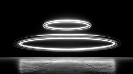 Glowing abstract rings of light in black and white on dark futuristic background