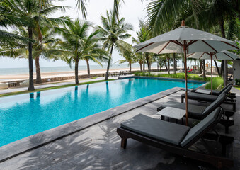 Relaxing poolside retreat coastal resort photography tropical paradise wide angle serenity