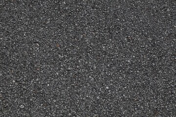 Road surface background. Asphalt dark grey blacktop road texture.