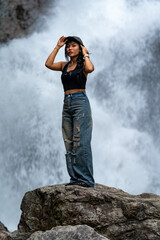 Naklejka premium Thai Girl at Water-falls and National Parks in Thailand