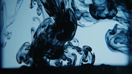 Dark ink swirls in liquid - Powered by Adobe