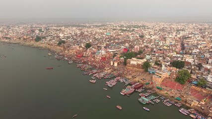 Varanasi, India: Aerial view of famous Dashashwamedh Ghat in ancient holy city on Ganges river - landscape panorama of Southeast Asia from above
