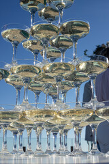 Champagne tower of sparkling wine glasses