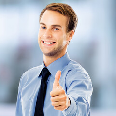 Image - happy smile confident business man in corporate blue shirt, tie show thumb up hand sign, against blur office background. Businessman, office person point give positive success gesture. Square
