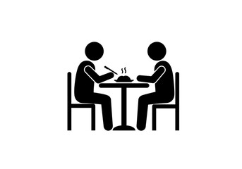 2 figures sit at a table with a steaming plate of food one holds utensils