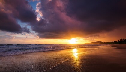 Fototapeta premium A Dramatic Sunrise Breaking Through Dark Storm Clouds Casting Golden And Pink Tones Over A Wet Tropical Beach After A Summer Rainstorm