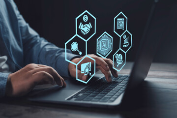 Businessman working on laptop with AI icons hovering above, representing the integration of artificial intelligence in business processes for automation, analysis, and decision making