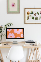 Computer desk setup, colorful floral screen