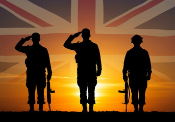 ​A symbolic and moving photograph of British armed forces, creating a sense of national pride and remembrance at dusk.
