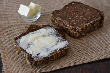 Bread with butter, breakfast, rustic food, healthy eating, seeded bread, food photography