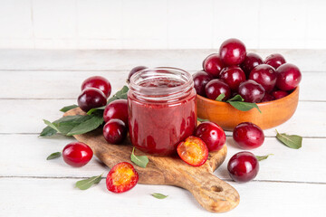 Cherry plum jam in small jar