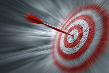 Red arrow hitting the bullseye of a target with a radial blur effect creating a sense of speed and focus