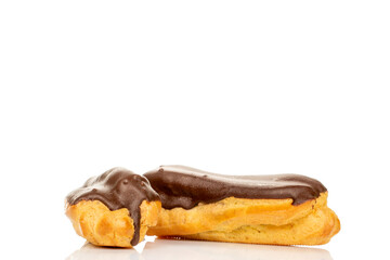 Chocolate sweet eclair, macro, isolated on white background.